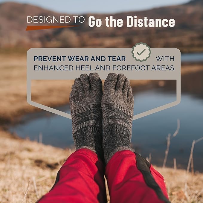 Person wearing toe-separated socks with scenic background